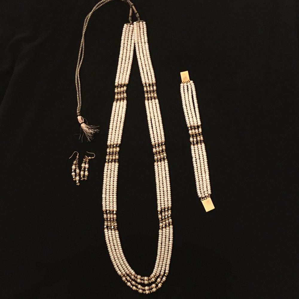Faux pearl and stone necklace set.